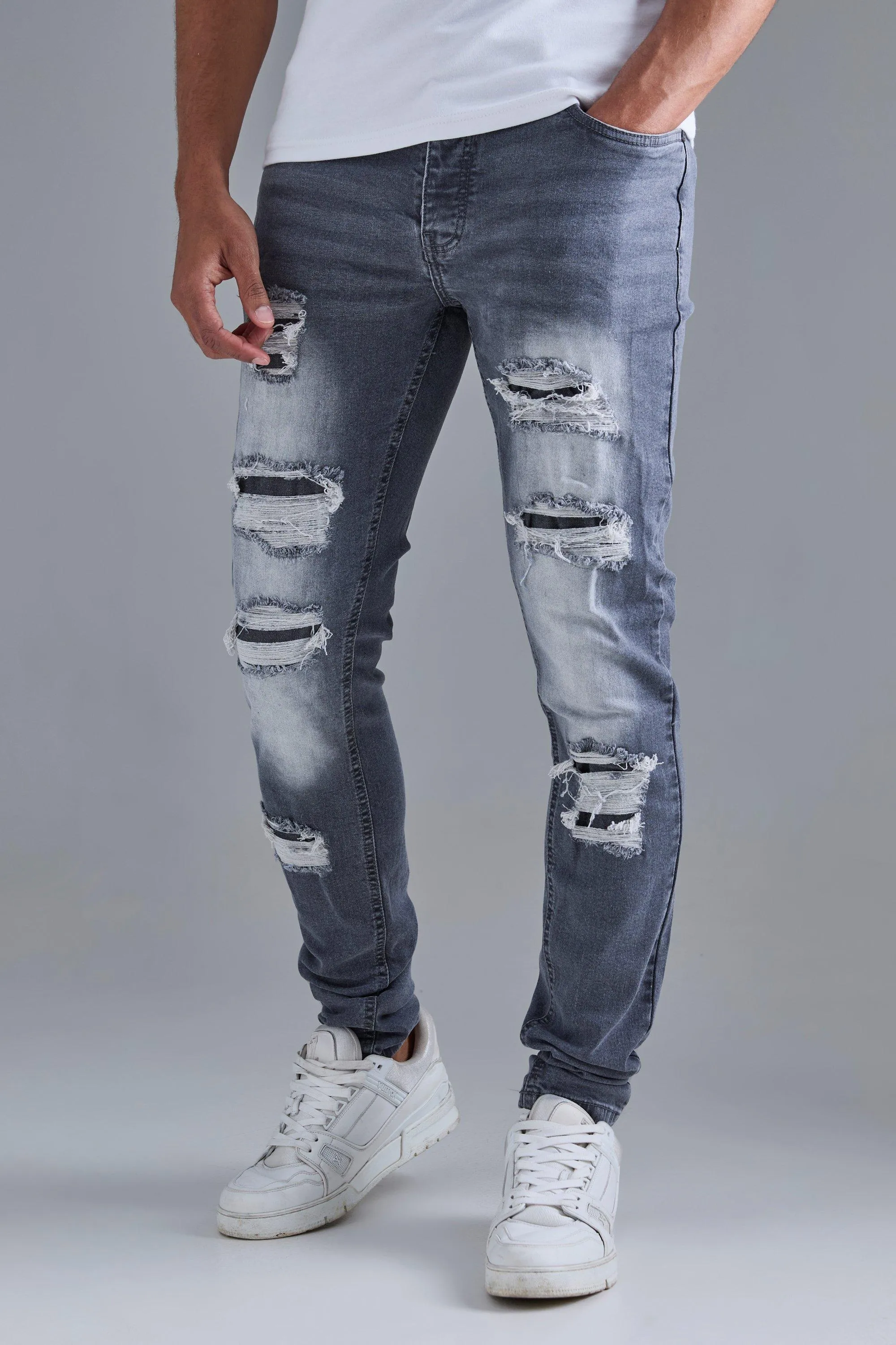 Skinny Stacked Distressed Ripped Jeans In Grey